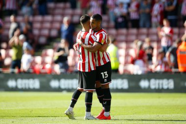 George Baldock #2 of Sheffield United and Max Lowe #13 of Sheffield United celebrate winning the game