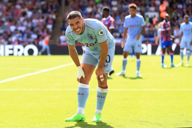 Emi Buenda of Aston Villa winces in pain.  