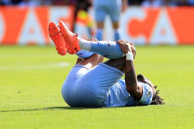 Tyrone Mings of Aston Villa is down with a knock. 
