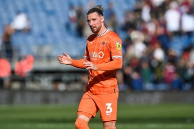James Husband #3 of Blackpool applauds the fans at the end of the game
