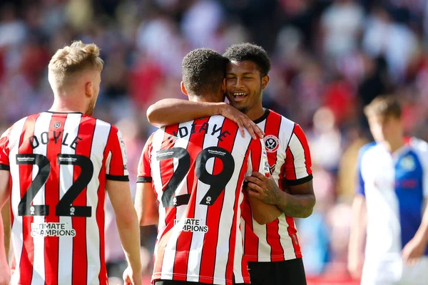 Iliman Ndiaye #29 of Sheffield United and Rhian Brewster #7 of Sheffield United celebrate winning the game