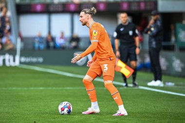 James Husband #3 of Blackpool in action during the game