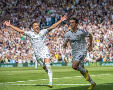Brenden Aaronson #7 of Leeds United celebrates his goal with Rodrigo Moreno and makes the score 1-0 