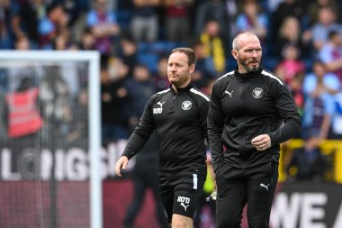 Michael Appleton manager of Blackpool makes his way to the dugout before the game