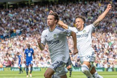 Brenden Aaronson #7 of Leeds United celebrates his goal with Rodrigo Moreno and makes the score 1-0 