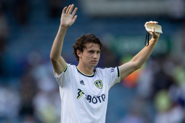 Goalscorer Brenden Aaronson #7 of Leeds United celebrates the victory over Chelsea with the supporters at full time 