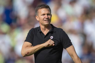 Jesse Marsch manager of Leeds United with the Leeds Salute as he celebrates the victory over Chelsea 3-0 with the supporters  