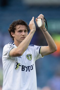 Goalscorer Brenden Aaronson #7 of Leeds United celebrates the victory over Chelsea with the supporters at full time 
