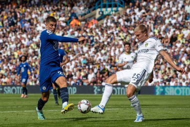 Rasmus Kristensen #25 of Leeds United blocks the shot of Kai Havertz #29 of Chelsea 