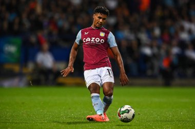 Ollie Watkins #11 of Aston Villa passes the ball