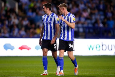 Ben Heneghan #5 of Sheffield Wednesday and Mark McGuinness #34 of Sheffield Wednesday 