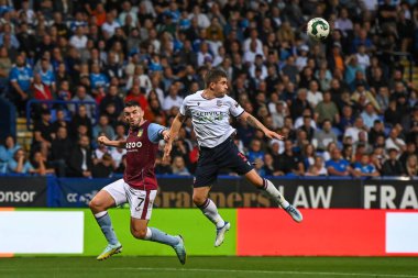 Declan John #3 of Bolton Wanderers wins the defensive header