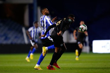 Sylla Sow #40 of Sheffield Wednesday and Ethan Ebanks-Landell #6 of Rochdale