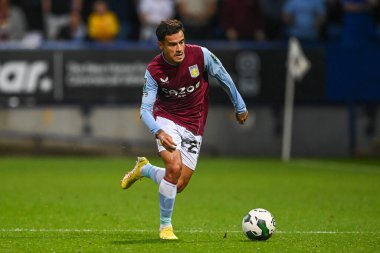 Philippe Coutinho #23 of Aston Villa  makes a break with the ball