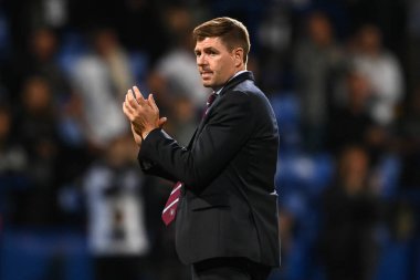 Steven Gerrard manager of Aston Villa applauds the fans at the end of the game