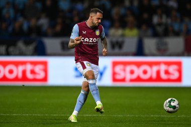 Danny Ings #9 of Aston Villa passes the ball
