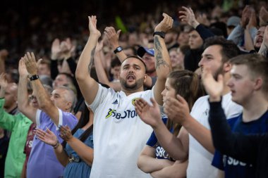 Leeds United supporters cheer on their team during the game 