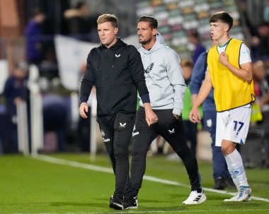 Eddie Howe manger of Newcastle United and his assistant Jason Tisdale approach the Travelling fans after the final whistle