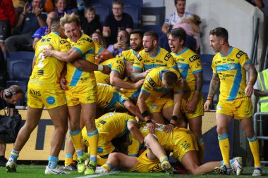 Blake Austin #6 of Leeds Rhinos celebrates his try to win the match