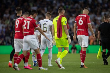 Liam Cooper #6 of Leeds United leads his team out ahead of this evening's game 