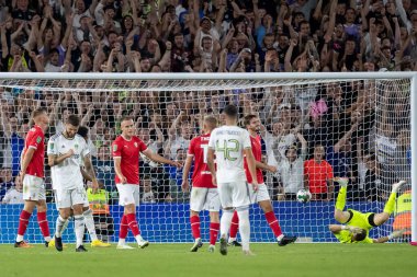 Mateusz Klich #43 of Leeds United takes a shot and scores in the second half to make it 3-1