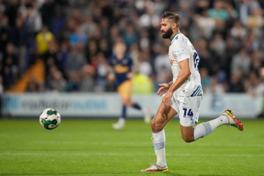 Jordan Turnbull #14 of Tranmere Rovers chases the ball