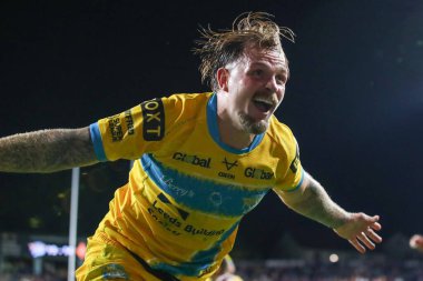 Blake Austin #6 of Leeds Rhinos celebrates his try to win the match