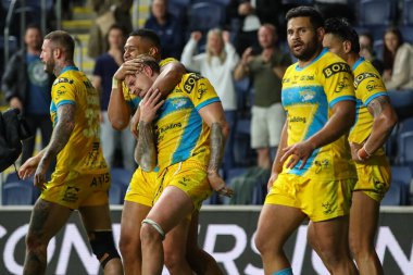 Blake Austin #6 of Leeds Rhinos celebrates his try to win the match