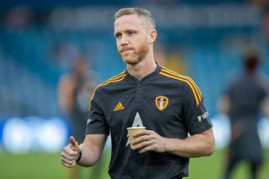Adam Forshaw #4 of Leeds United gives a thumbs up as he arrives at Elland Road Stadium ahead of tonights game  