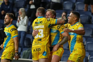 Blake Austin #6 of Leeds Rhinos celebrates his try to win the match