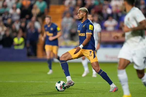 Joelinton #7 of Newcastle United breaks forward 