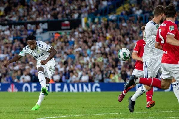 Luis Sinisterra #23 of Leeds United takes a shot and scores a goal to make it 1-0 during the first half 