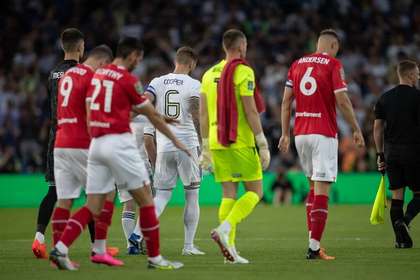 Liam Cooper #6 of Leeds United leads his team out ahead of this evening's game 
