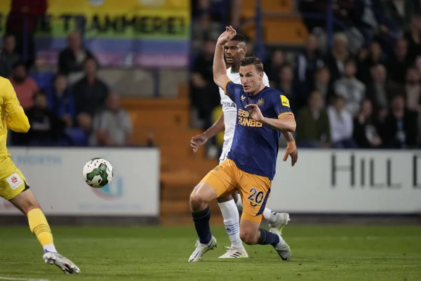Chris Wood #20 of Newcastle United shoots at the Tranmere Rovers goal