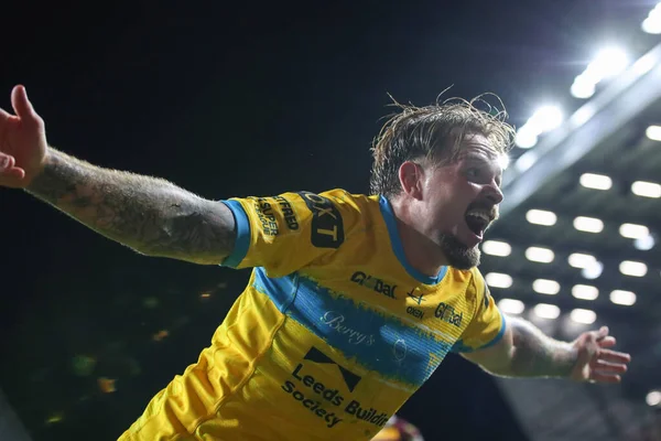 Blake Austin #6 of Leeds Rhinos celebrates his try to win the match