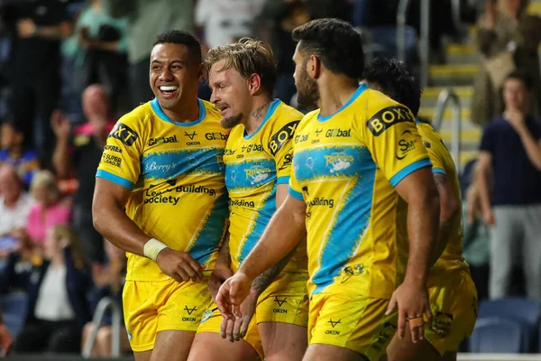 Blake Austin #6 of Leeds Rhinos celebrates his try to win the match