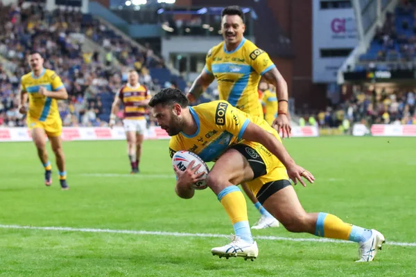 Rhyse Martin #12 of Leeds Rhinos goes over for a try 