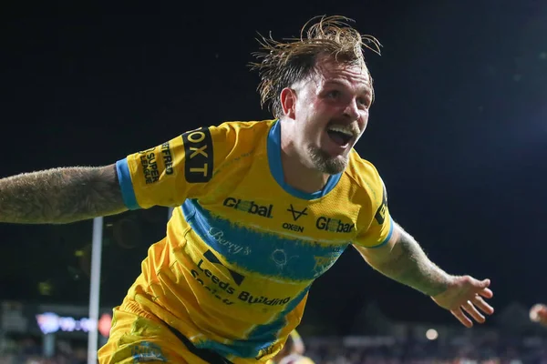 Blake Austin #6 of Leeds Rhinos celebrates his try to win the match