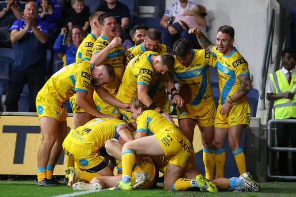 Blake Austin #6 of Leeds Rhinos celebrates his try to win the match