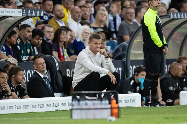 Jesse Marsch manager of Leeds United sits down in his technical area during the first half 