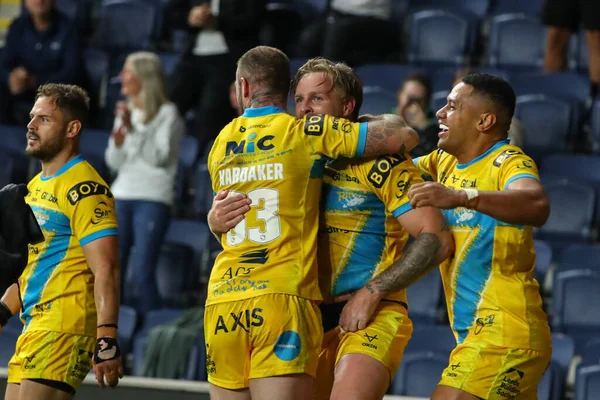 Blake Austin #6 of Leeds Rhinos celebrates his try to win the match