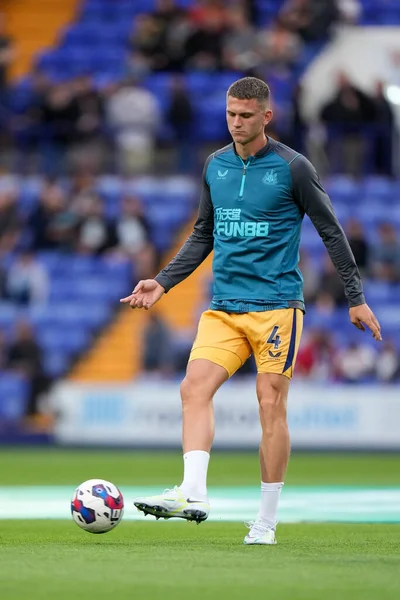 Sven Botman #4 of Newcastle United warms up before the game