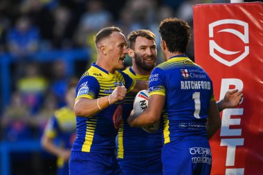 Stefan Ratchford #1 of Warrington Wolves \celebrates his 100th Career try
