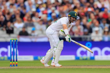 Dean Elgar of South Africa plays and misses the ball