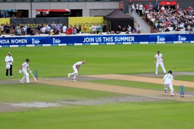 Stuart Broad of England bowls to Rassie van der Dussen of South Africa