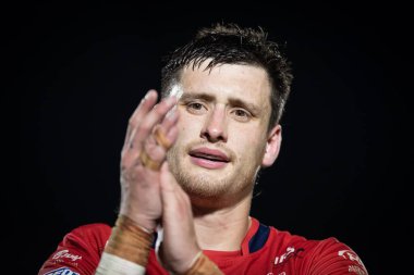 Sam Wood #24 of Hull KR claps his hands and applauds the supporters at full-time 