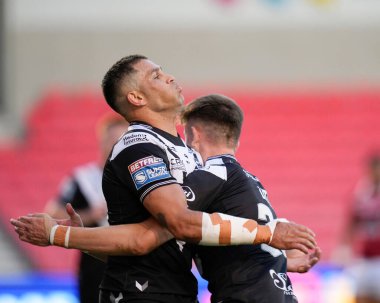 Luke Gale #7 of Hull FC is congratulated after scoring his sides opening try