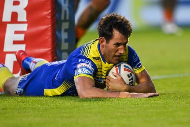 Stefan Ratchford #1 of Warrington Wolves goes over for his 100th Career try