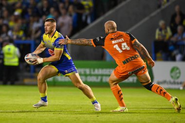 Danny Walker #16 of Warrington Wolves evades the tackle of Nathan Massey #14 of Castleford Tigers