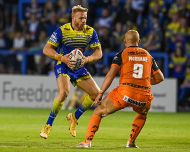 Oliver Holmes #12 of Warrington Wolves in action